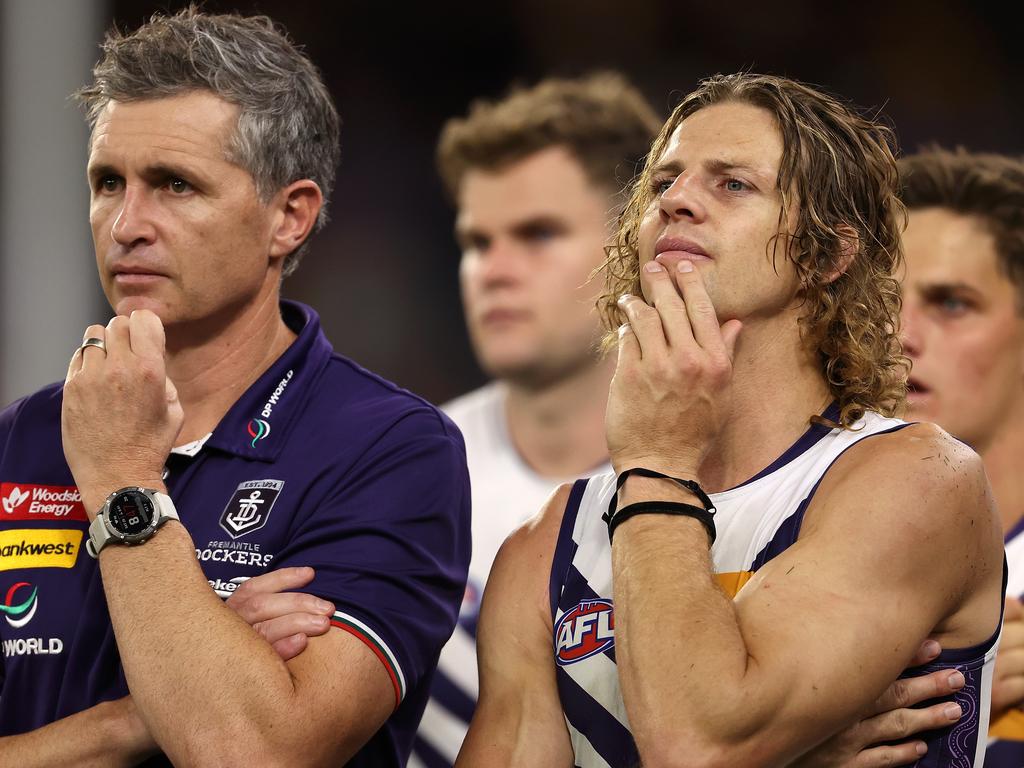 PERTH, AUSTRALIA - APRIL 20: Justin Longmuir, Senior Coach of the Dockers and Nat Fyfe look on after being defeated during the round six AFL match between West Coast Eagles and Fremantle Dockers at Optus Stadium, on April 20, 2024, in Perth, Australia. (Photo by Paul Kane/Getty Images)