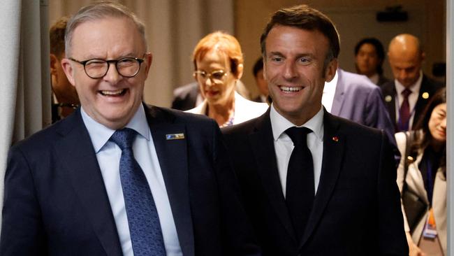 Australian Prime Minister Anthony Albanese with French President Emmanuel Macron on the sidelines of the NATO summit, in Vilnius. (Photo by Ludovic MARIN / AFP)