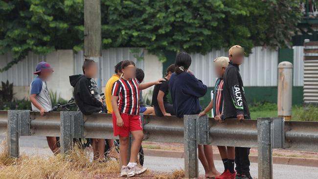 Youths gather along Able Smith Pde, Mount Isa. Picture: Liam Kidston