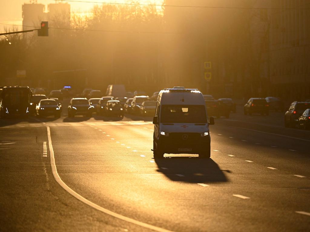 An ambulance races through Moscow where Covid deaths are rising. Picture: AFP