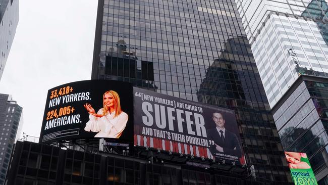 A billboard by The Lincoln Project is seen in Times Square in New York, depicting Ivanka Trump presenting the number of New Yorkers and Americans who have died due to COVID-19 along with her husband Senior Adviser to the President Jared Kushner, with a Vanity Fair quote. Picture: AFP