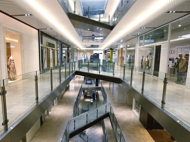 MELBOURNE, AUSTRALIA - AUGUST 12: An empty Emporium shopping centre is seen on August 12, 2020 in Melbourne, Australia. Victoria has recorded 410 new coronavirus cases overnight, along with 21 COVID-19 deaths, the highest daily death toll since the pandemic began in Australia. Metropolitan Melbourne is under stage 4 lockdown restrictions, with people only allowed to leave home to give or receive care, shopping for food and essential items, daily exercise and work while an overnight curfew from 8pm to 5am is also in place. The majority of retail businesses are also closed. Other Victorian regions are in stage 3 lockdown. The restrictions, which came into effect from 2 August, have been introduced by the Victorian government as health authorities work to reduce community COVID-19 transmissions across the state. (Photo by Darrian Traynor/Getty Images)