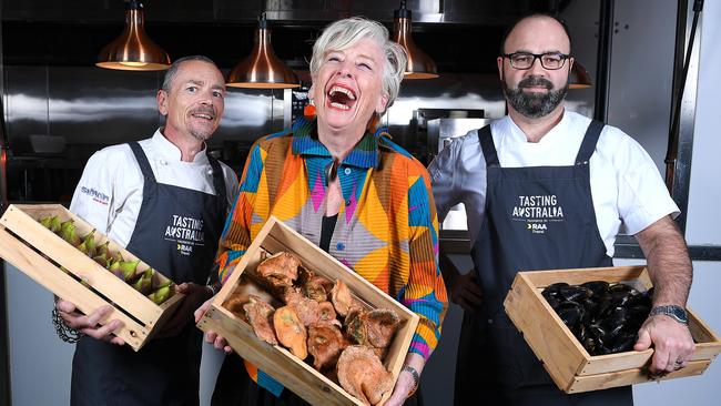 Tasting Australia festival director Simon Bryant, with event stars Maggie Beer and Paul Baker, holding SA produce Gumeracha Figs, Porcini Mushrooms and West Coast Mussles in the Town Square Kitchen. Picture: Mark Brake.