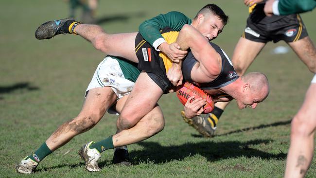 Billy Bedford tackles Chaz Sargeant. Picture: Chris Eastman