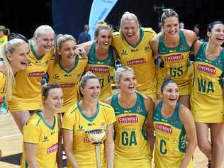 Clare McMeniman holds the trophy as the Australian Diamonds celebrate their series defeat of New Zealand in the Constellation Cup. Many of the same players will be hoping to be in the team for the 2018 Commonwealth Games. Picture: ROSS SETFORD