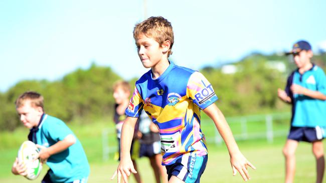 Rhys Yore, age 8, in 2013. Junior rugby league players taking part in a clinic at Webb Oval, Yeppoon, with Bulldogs players. Photo Sharyn O'Neill/The Morning Bulletin.