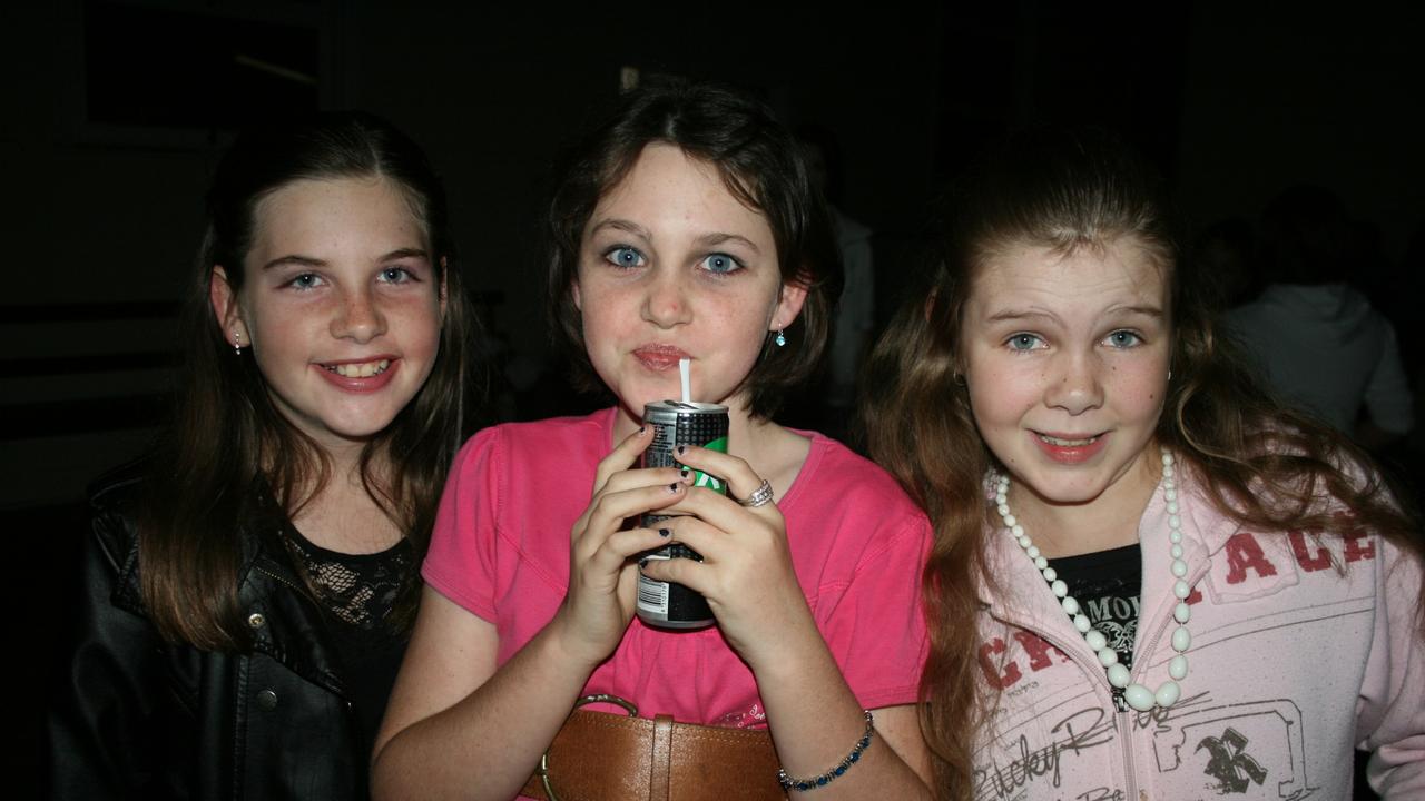 Shanice Graham, Kaitlyn Noble and Pennylee Lawrence take time out for refreshments at the Blue Light Disco. Photo Deanna Millard / Warwick Daily News