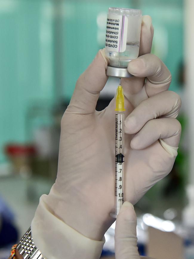 A nurse prepares a dose of the AstraZeneca/Oxford Covid-19 vaccine. Picture: AFP