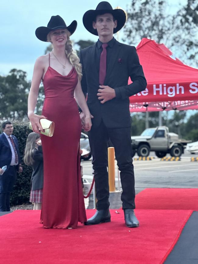 The students of Urangan State High School arriving at their formal.