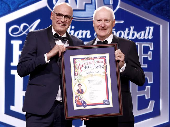 Hall of Fame inductee Michael Aish with Richard Goyder. (Photo by Michael Willson/AFL Photos/via Getty Images)