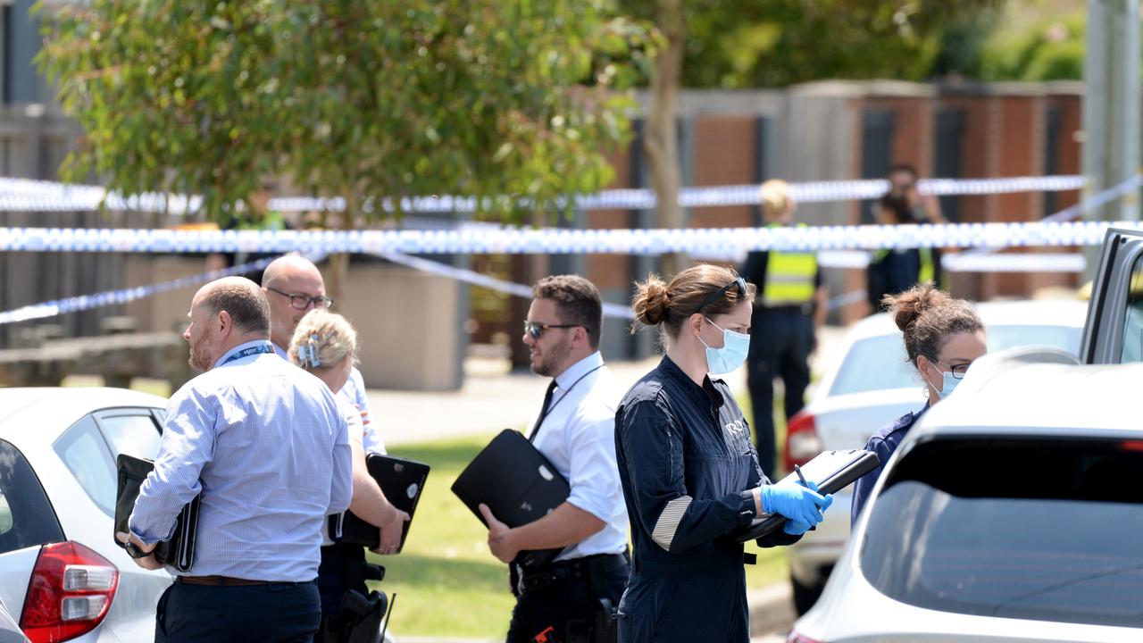 Police set up a crime scene outside units on James St in Mordialloc where two people were found dead inside a property. Picture: NewsWire / Andrew Henshaw