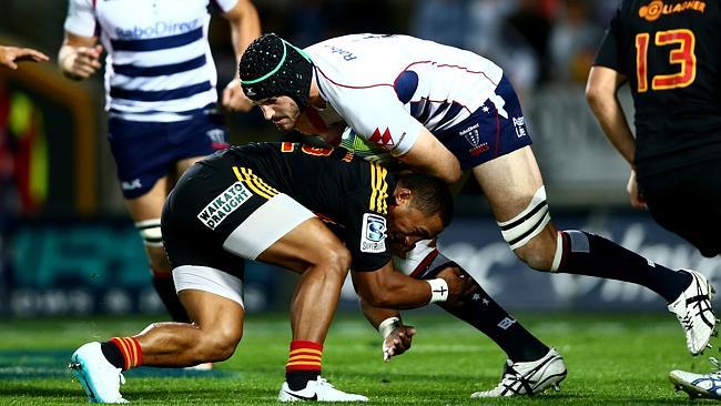 Hugh Pyle charges ahead for the Rebels against the Chiefs.