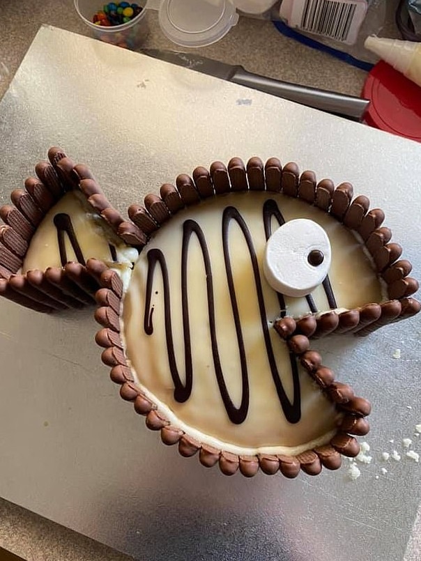 A mum has shared her ‘simple yet effective’ Woolies mud cake hack online. Picture: Facebook/Woolies/Coles Mudcake Hacks