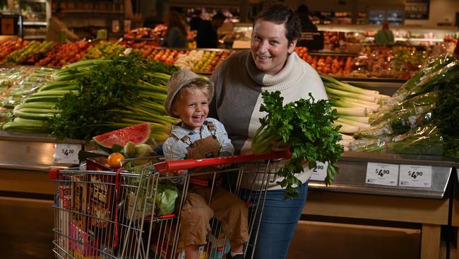 Louise Jones, with son Leo at Coles Greenacres, says any money saved would be welcomed in her family. Picture: Naomi Jellicoe