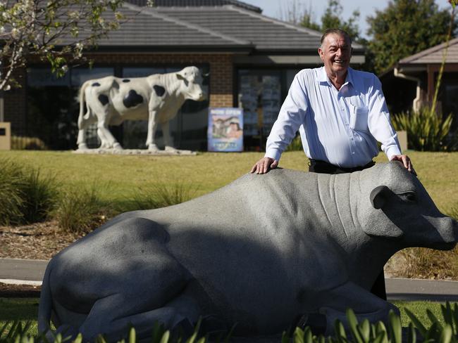 Tony Perich,billionaire property developer and also one of the nation's biggest dairy cattle owners, poses for a photograph The Australian / Picture David Moir 10/10/2014Tony Perich,billionaire property developer and also one of the nation's biggest dairy cattle owners, poses for a photograph next to a carved granite bull, which sits next to a play park outside his office at the Oran Park developmentThe Australian / Picture David Moir 10/10/2014