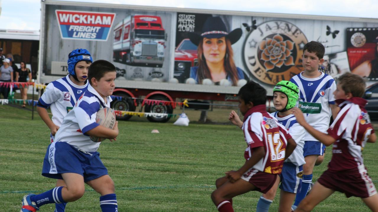 Todd Newport in possession for Collegians against Suburbs in under-10 rugby league at Killarney. Photo Deanna Millard/Warwick Daily News.