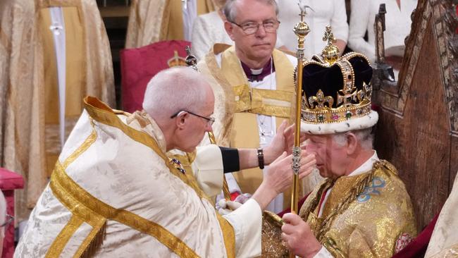 I was the guy in the background, hoping/praying/sweating for the crown to sit tight. Picture: Victoria Jones/AFP