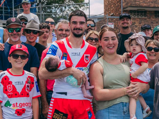 Cody Ramsey holding daughter Ella with partner Tahlia and eldest daughter Mia at Henson Park. Pic: Morgan Taylor Dragons Digital