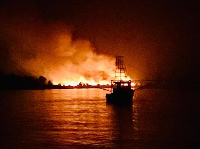 Congratulations to Paola Sisson for winning this week's Cover Image competition for their photo of a fishing trawler against a cane fire backdrop.