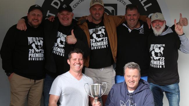 Lee Whitehorn (front, left) celebrates the 2022 division one premiership with fellow Port District coaches. He is in the midst of a major battle with brain cancer. Picture: Port District Football Club