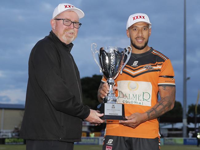 Eni Folau of Southport Tigers receives the trophy after their convincing win against Tugun Seahawks in the Grade A Gold Coast Rugby League grand final. Photo: Regi Varghese