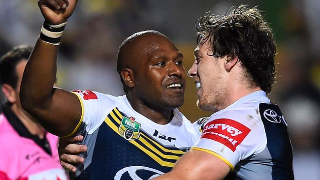 TOWNSVILLE, AUSTRALIA - SEPTEMBER 13: Robert Lui (L) of the Cowboys celebrates with Rory Kostjasyn after scoring a try during the NRL 1st Elimination Final match between the North Queensland Cowboys and the Brisbane Broncos at 1300SMILES Stadium on September 13, 2014 in Townsville, Australia. (Photo by Ian Hitchcock/Getty Images)