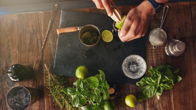 A bartender experimenting with new cocktail ingredients. Picture: Supplied