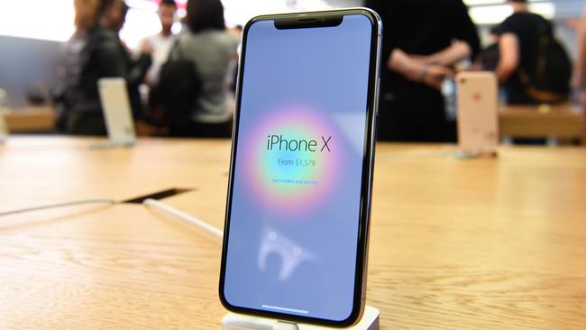 An iPhone X sits on a table following its global launch inside the Apple Store in Sydney, Friday, November 3, 2017. Picture: AAP Image/David Moir