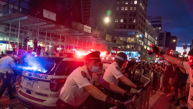 Police confront protesters in Union Square in New York City.