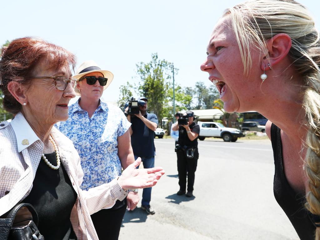 Local Resident Ginger O'Brien shouts at Member for Lismore Janell Saffin in the bushfire affected area of Nimbin. picture: Jason O'Brien/AAP