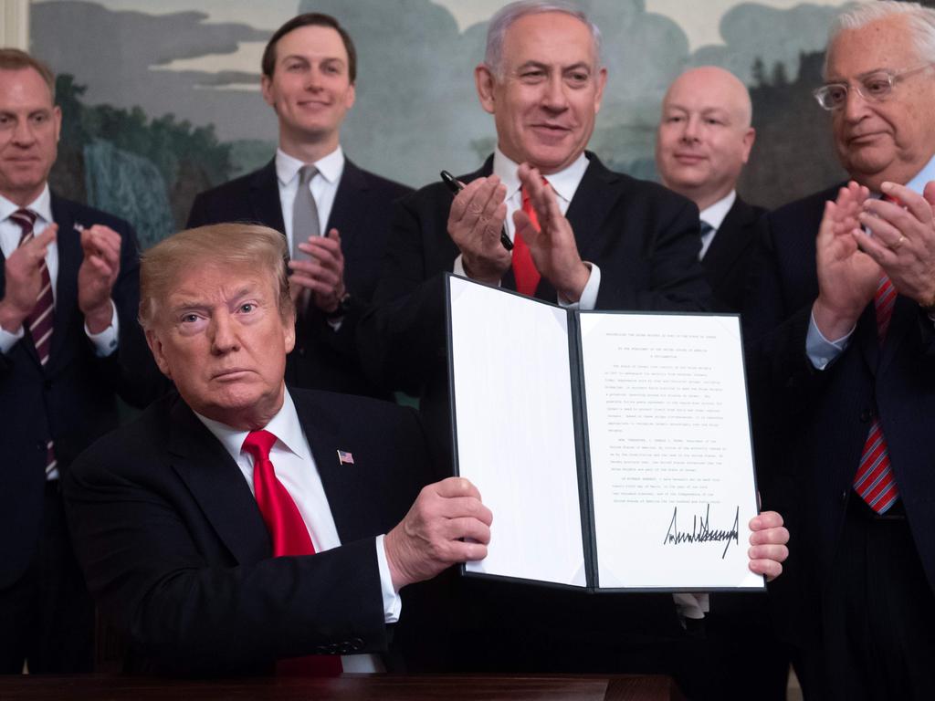 US President Donald Trump signs a Proclamation on the Golan Heights alongside Israeli Prime Minister Benjamin Netanyahu at the White House in Washington. Picture: AFP