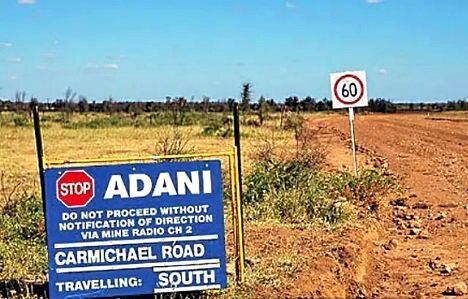 A risk analysis company has warned that investing near the Adani mine would be very risky. But a local agent said with risk, sometimes comes reward.