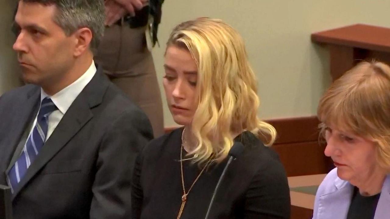 Amber Heard reacts to the jury's verdict. Picture: Supplied