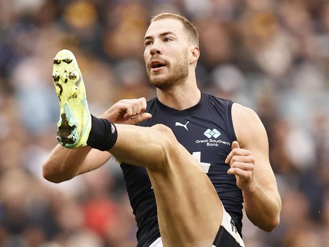 MELBOURNE, AUSTRALIA - JULY 02: Harry McKay of the Blues kicks for goal during the round 16 AFL match between Hawthorn Hawks and Carlton Blues at Melbourne Cricket Ground, on July 02, 2023, in Melbourne, Australia. (Photo by Darrian Traynor/Getty Images)