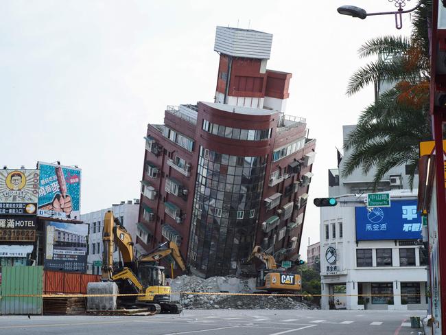 At least nine people were killed and more than 1,000 injured by a powerful earthquake in Taiwan that damaged dozens of buildings. Picture: AFP