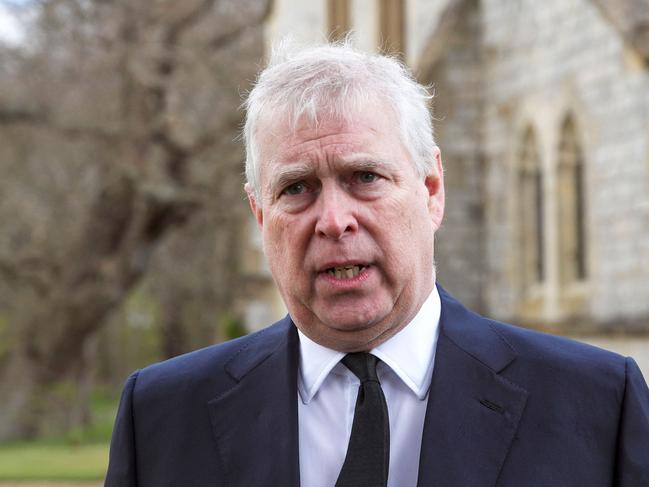 Britain's Prince Andrew, Duke of York, speaks during a television interview outside the Royal Chapel of All Saints in Windsor on April 11, 2021, two days after the death of his father Britain's Prince Philip, Duke of Edinburgh. - Queen Elizabeth II has described feeling a "huge void in her life" following the death of her husband Prince Philip, their son Prince Andrew said on April 11. Andrew, the couple's second son, said following family prayers at Windsor Castle that his mother was "contemplating" her husband's passing after his death on April 9 aged 99. (Photo by Steve Parsons / POOL / AFP)