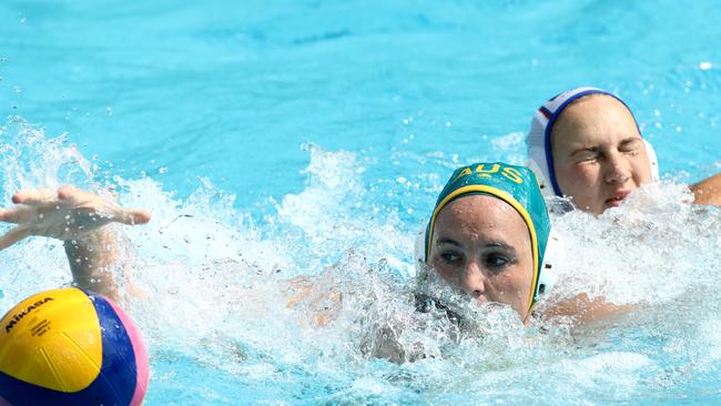 RIO DE JANEIRO, BRAZIL — AUGUST 09: Bronwen Knox of Australia gets possession of the ball during the Preliminary Round, Group A Womens Waterpolo match between Russia and Australia on Day 4 of the Rio 2016 Olympic Games at the Maria Lenk Aquatics Centre on August 9, 2016 in Rio de Janeiro, Brazil. (Photo by Phil Walter/Getty Images)