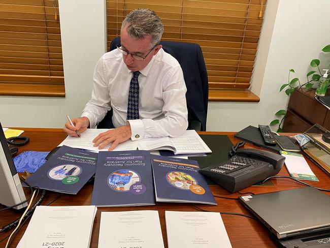 Page MP Kevin Hogan crunching the numbers ahead of the release of the Federal Government's 2020-21 Budget.