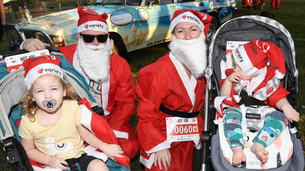 Laura Campbell, Anthony Ballantyne, Flynn Ballantyne and Joss Ballantyne at the Darwin Santa Fun Run in July at Mindil Beach. Picture Katrina Bridgeford