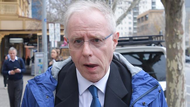 The head of medical imaging at the Royal Adelaide Hospital, Dr Jim Buckley, leaves the Coroner’s Court last year after giving evidence at the inquest into the deaths of stroke victims Michael John Russell and Leslie Robert Graham. Picture: David Mariuz/AAP