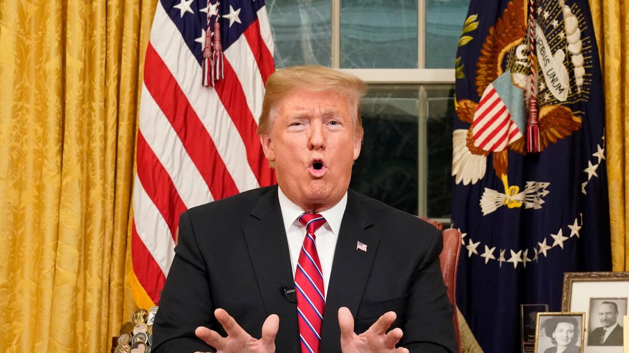 Donald Trump delivers a televised address to the nation on funding for a border wall from the Oval Office of the White House in Washington DC on January 8, 2019. Picture: AFP