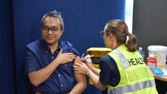 Gulam Khandaker receiving the first COVID-19 vaccine in Rockhampton.