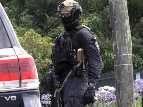 Police during a drug raid at Unanderra in December 2020. Picture: NSW Police