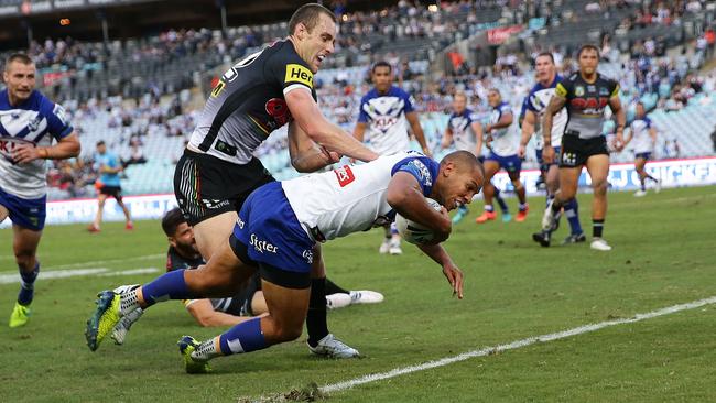 Bulldogs Moses Mbye scores his second try during the Bulldogs v Penrith rugby league match at ANZ Stadium, Sydney. Picture: Brett Costello