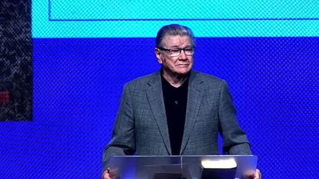 Senior Pastor Claude Fingleton speaking at Luke's funeral service.