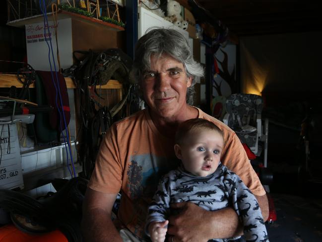 Gary Moratti of Eagleby is a victim of Silicosis. Pictured with grandson Frank. (AAP Image/Richard Waugh)