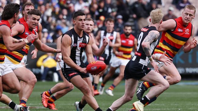 Nick Daicos weaves his way through traffic. Picture: Michael Klein