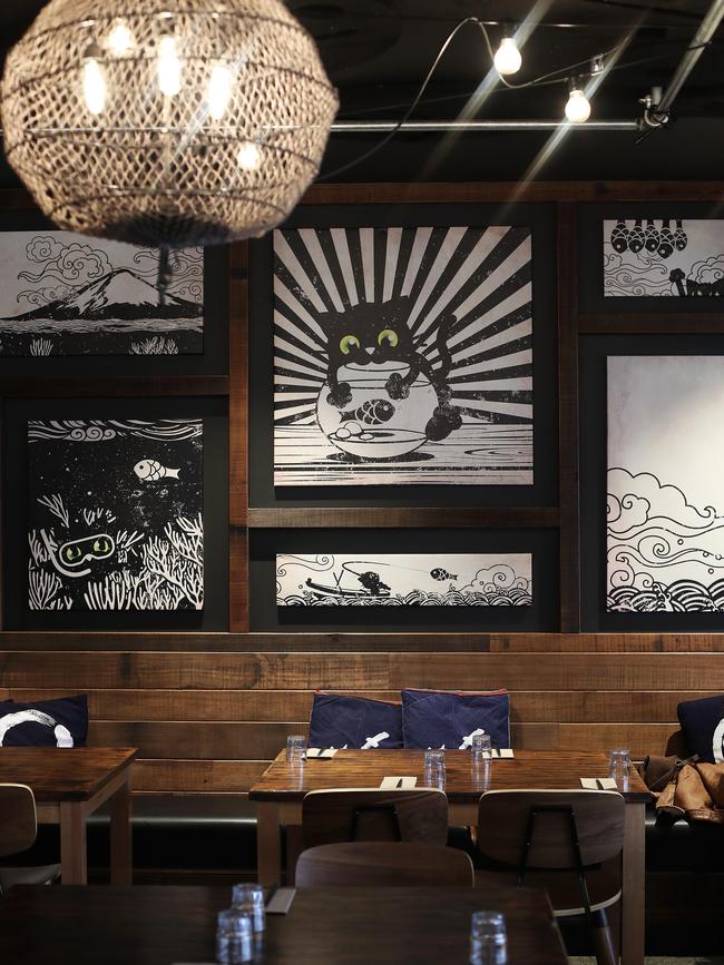 Cat paintings feature at Panko Chan. Picture: LUKE BOWDEN