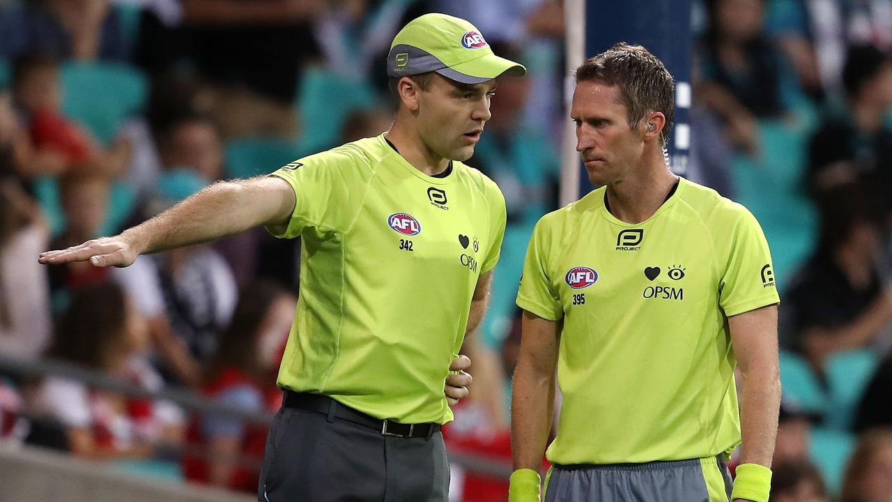 Goal umpires were busy on the weekend as scoring rose and games lasted longer. (Photo by Mark Kolbe/Getty Images)