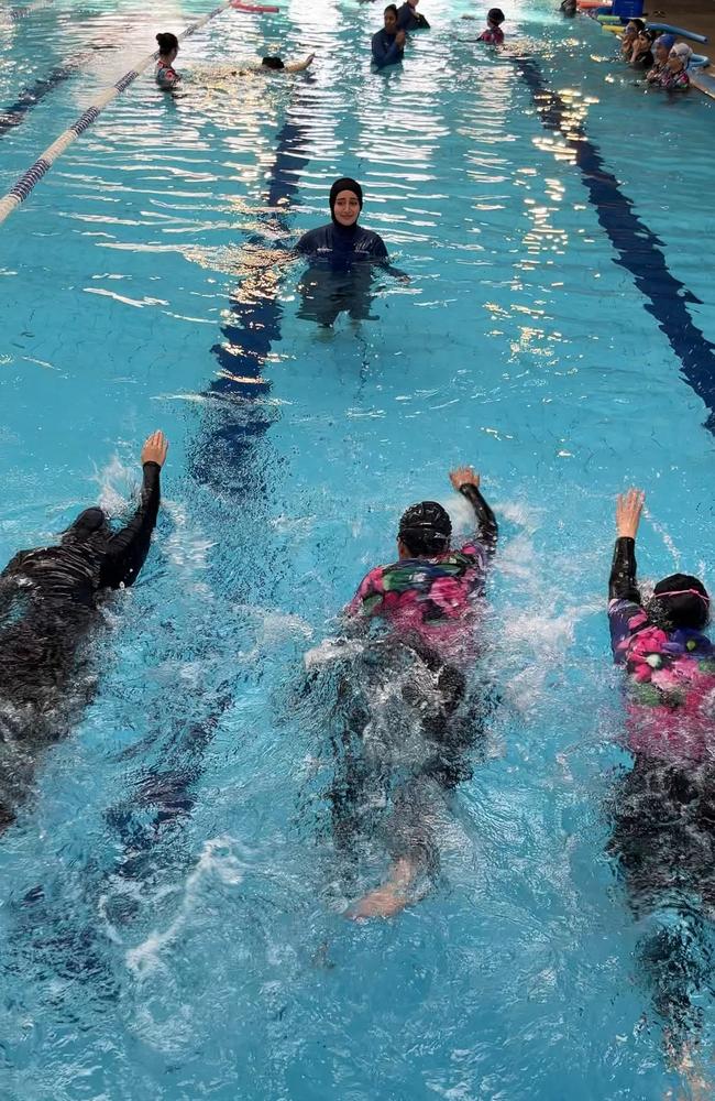 A class of 20 Afghan women who recently arrived in Australia come together twice a week at the Whitlam centre to learn how to swim. Picture: Inasha Iftekhar